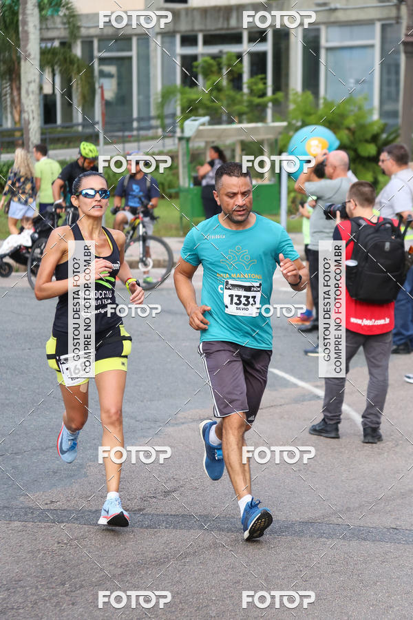 Buy your photos of the eventMeia Maratona Internacional de Curitiba 2018 on Fotop