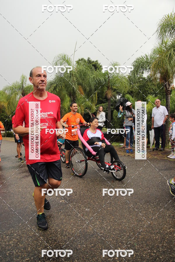 Buy your photos of the event3� Corrida Pernas de Aluguel 10K on Fotop