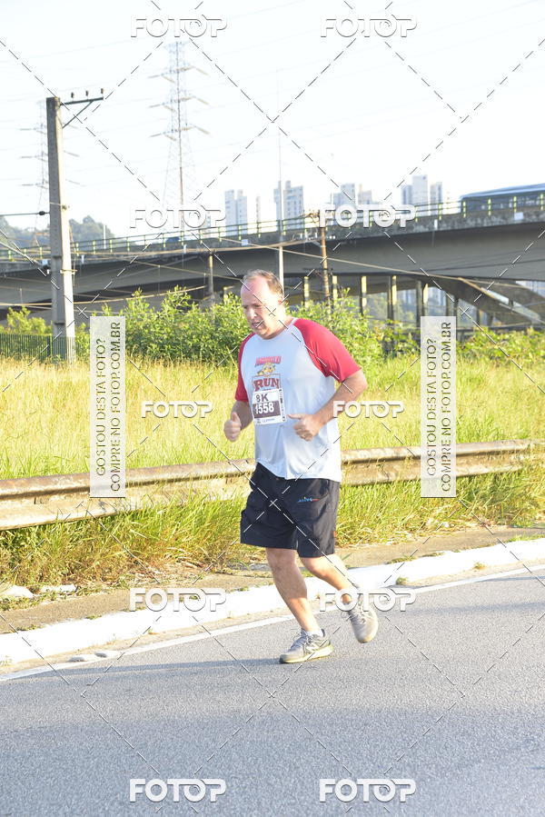 Compre as suas fotos do eventoArnold Run 8k no Fotop