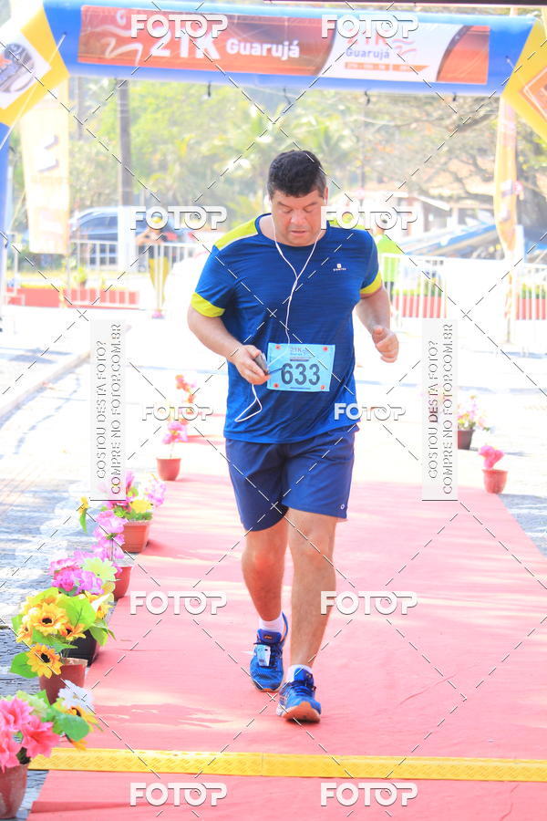Buy your photos of the event21k Guaruj on Fotop