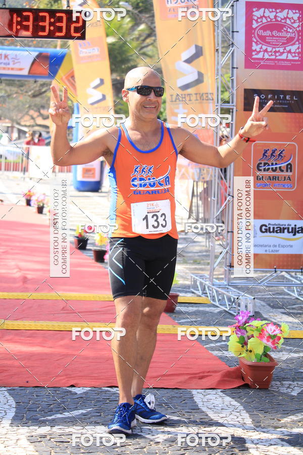 Acquista le foto dell'evento21k Guaruj in Fotop
