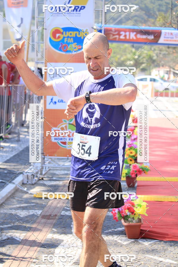 Achetez vos photos de l'vnement21k Guaruj sur Fotop