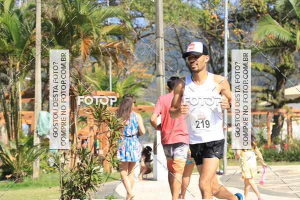 Buy your photos of the event21k Guaruj on Fotop