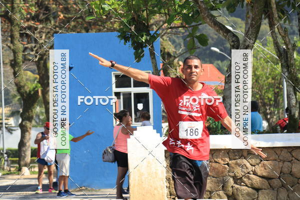 Acquista le foto dell'evento21k Guaruj in Fotop