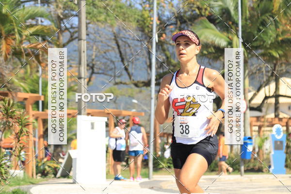 Acquista le foto dell'evento21k Guaruj in Fotop
