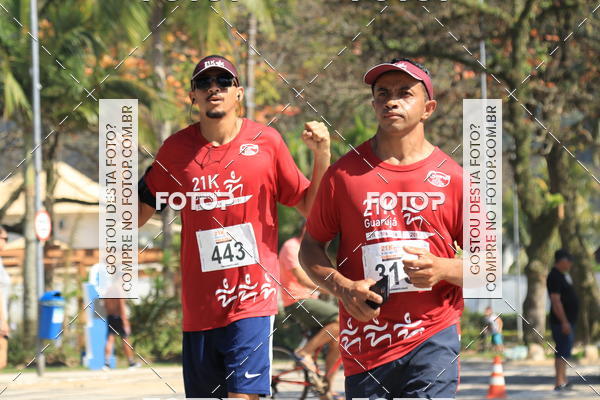 Acquista le foto dell'evento21k Guaruj in Fotop
