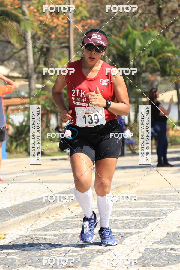 Buy your photos of the event21k Guaruj on Fotop