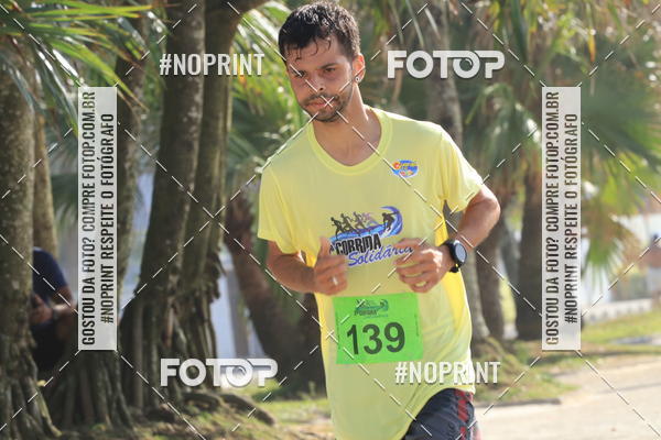 Buy your photos of the eventSegunda Corrida Solidria Projeto Ondas - Circuito Guaruj Terceira Etapa on Fotop