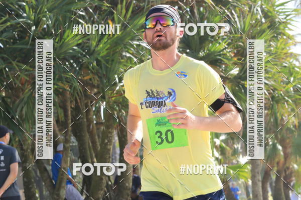 Buy your photos of the eventSegunda Corrida Solidria Projeto Ondas - Circuito Guaruj Terceira Etapa on Fotop