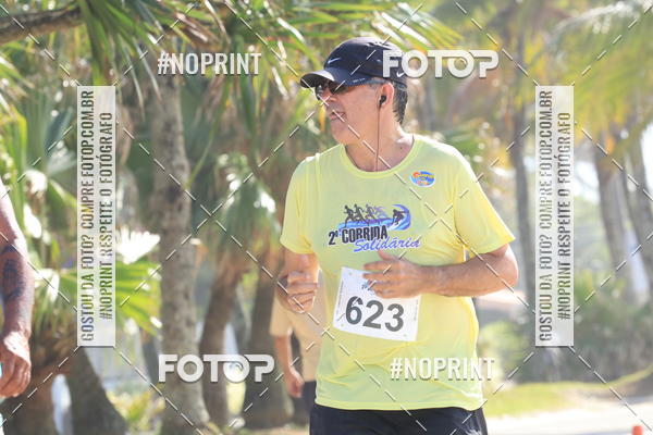 Buy your photos of the eventSegunda Corrida Solidria Projeto Ondas - Circuito Guaruj Terceira Etapa on Fotop
