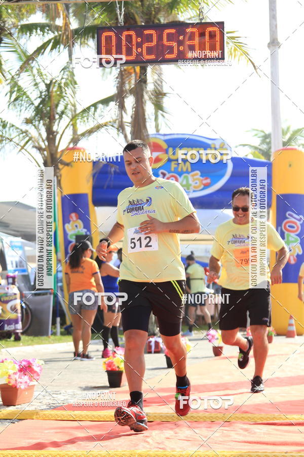 Buy your photos of the eventSegunda Corrida Solidria Projeto Ondas - Circuito Guaruj Terceira Etapa on Fotop