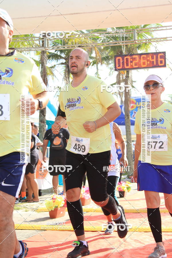 Buy your photos of the eventSegunda Corrida Solidria Projeto Ondas - Circuito Guaruj Terceira Etapa on Fotop