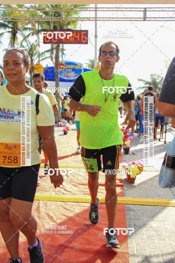 Buy your photos of the eventSegunda Corrida Solidria Projeto Ondas - Circuito Guaruj Terceira Etapa on Fotop