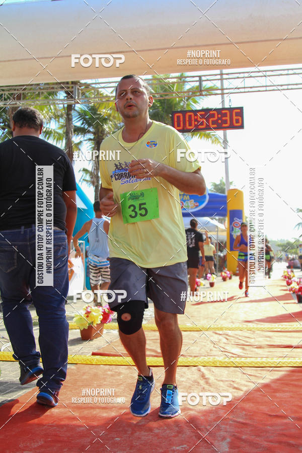Buy your photos of the eventSegunda Corrida Solidria Projeto Ondas - Circuito Guaruj Terceira Etapa on Fotop