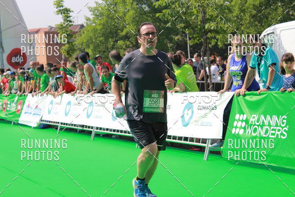 Buy your photos of the eventMeia Maratona Guimares on Fotop