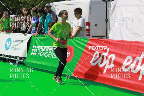 Buy your photos of the eventMeia Maratona Guimares on Fotop