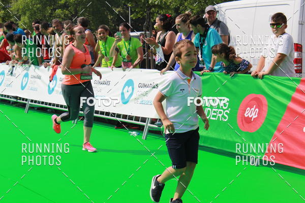 Buy your photos of the eventMeia Maratona Guimares on Fotop