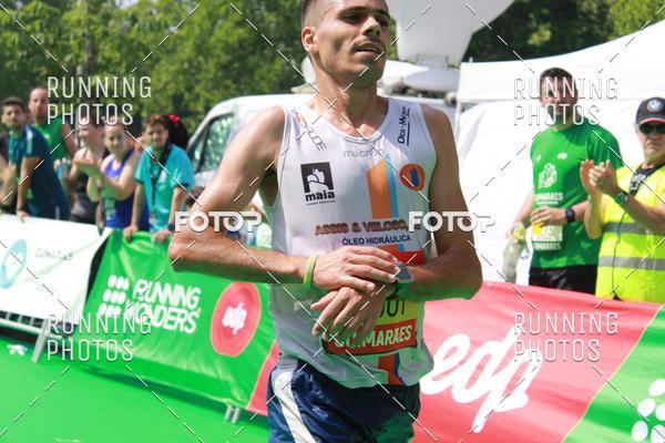 Buy your photos of the eventMeia Maratona Guimares on Fotop