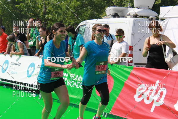 Buy your photos of the eventMeia Maratona Guimares on Fotop