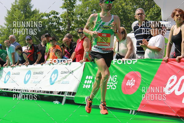 Buy your photos of the eventMeia Maratona Guimares on Fotop