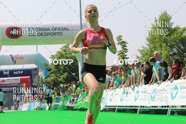Buy your photos of the eventMeia Maratona Guimares on Fotop