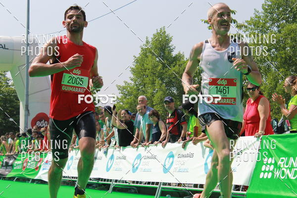 Buy your photos of the eventMeia Maratona Guimares on Fotop
