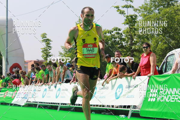 Buy your photos of the eventMeia Maratona Guimares on Fotop
