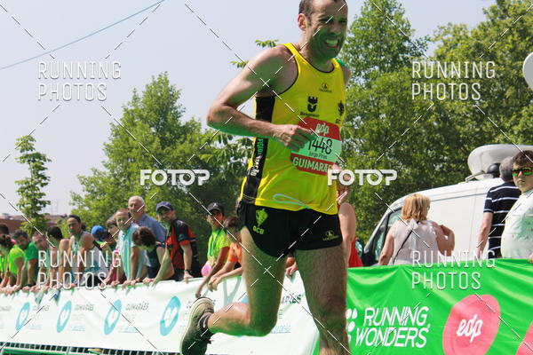 Buy your photos of the eventMeia Maratona Guimares on Fotop