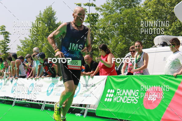 Buy your photos of the eventMeia Maratona Guimares on Fotop