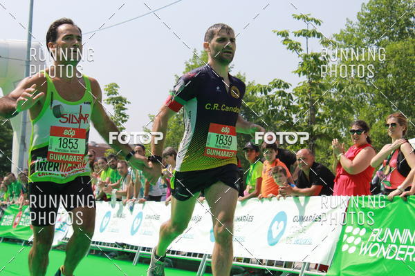 Buy your photos of the eventMeia Maratona Guimares on Fotop
