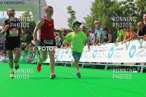 Buy your photos of the eventMeia Maratona Guimares on Fotop