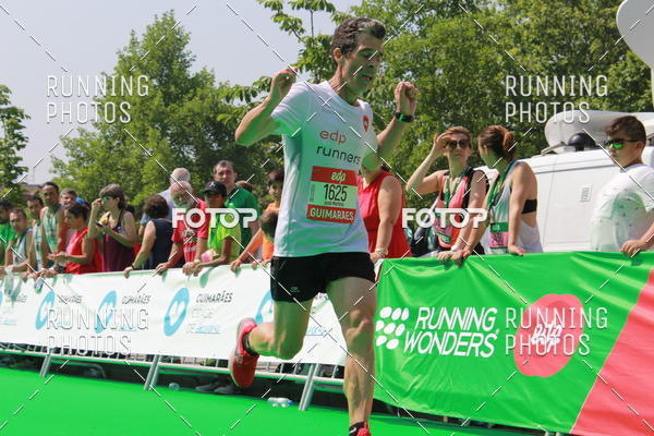 Buy your photos of the eventMeia Maratona Guimares on Fotop