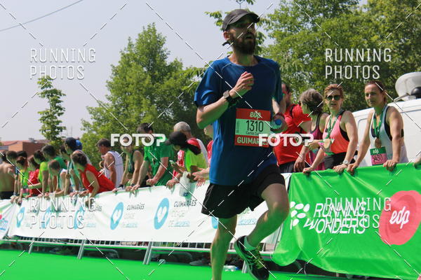 Buy your photos of the eventMeia Maratona Guimares on Fotop