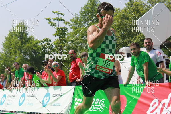 Buy your photos of the eventMeia Maratona Guimares on Fotop