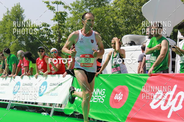 Buy your photos of the eventMeia Maratona Guimares on Fotop