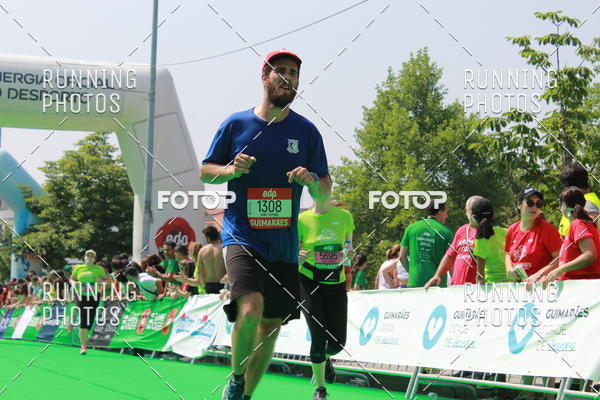 Buy your photos of the eventMeia Maratona Guimares on Fotop
