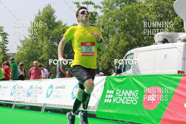 Buy your photos of the eventMeia Maratona Guimares on Fotop