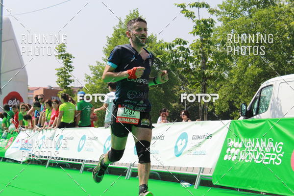 Buy your photos of the eventMeia Maratona Guimares on Fotop