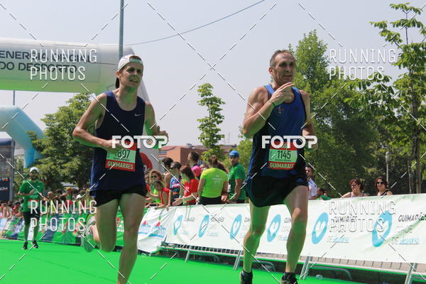 Buy your photos of the eventMeia Maratona Guimares on Fotop