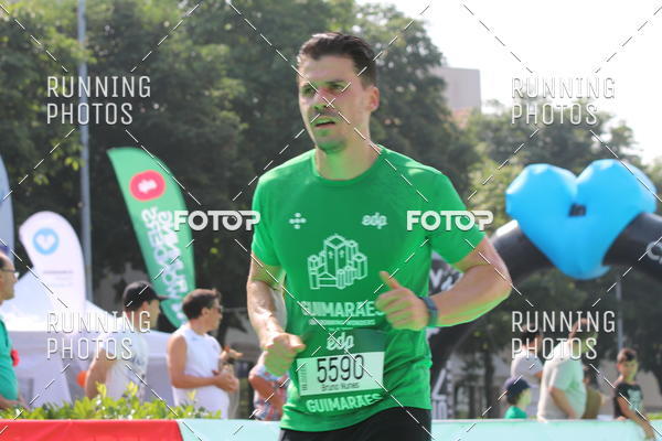 Buy your photos of the eventMeia Maratona Guimares on Fotop
