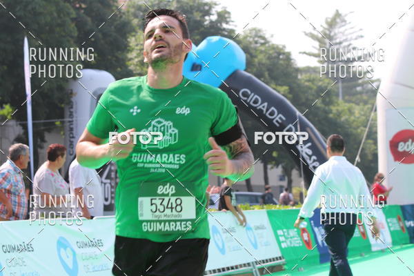 Buy your photos of the eventMeia Maratona Guimares on Fotop