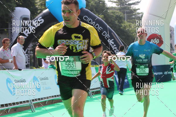 Buy your photos of the eventMeia Maratona Guimares on Fotop