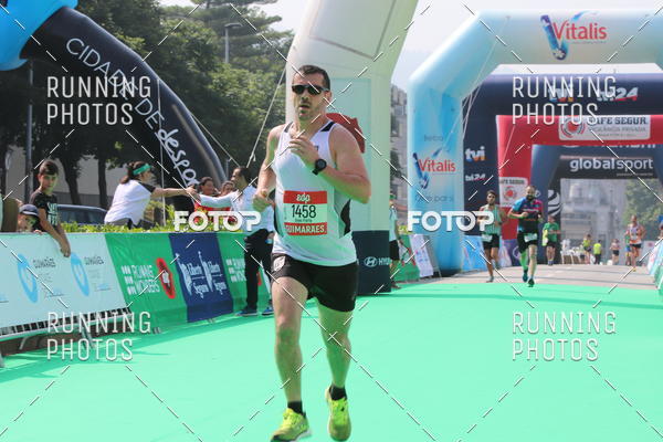 Buy your photos of the eventMeia Maratona Guimares on Fotop