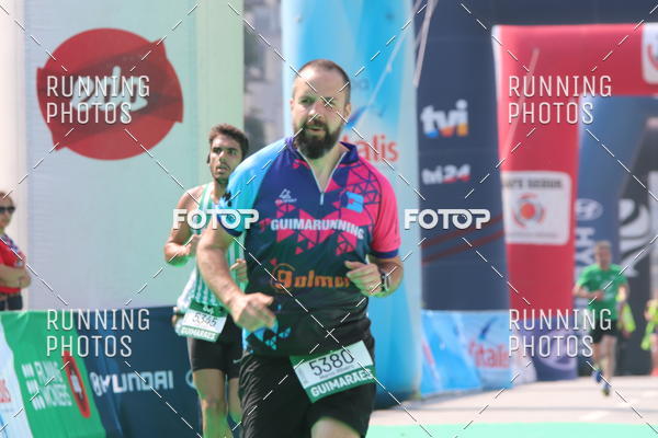 Buy your photos of the eventMeia Maratona Guimares on Fotop