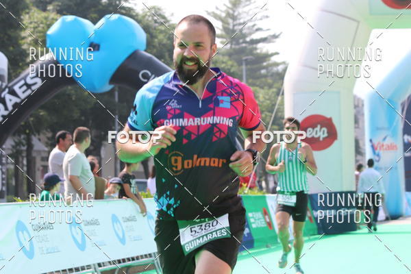 Buy your photos of the eventMeia Maratona Guimares on Fotop