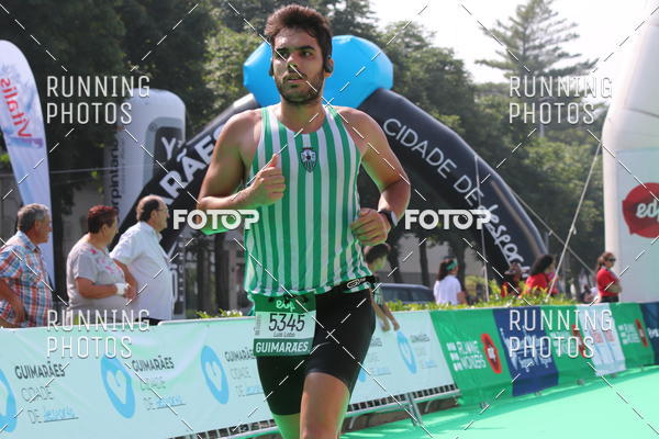 Buy your photos of the eventMeia Maratona Guimares on Fotop