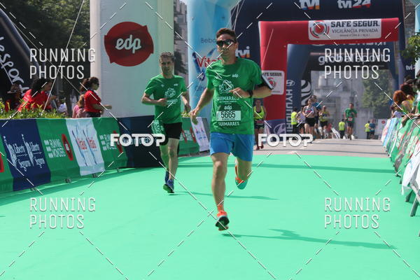 Buy your photos of the eventMeia Maratona Guimares on Fotop