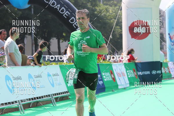 Buy your photos of the eventMeia Maratona Guimares on Fotop