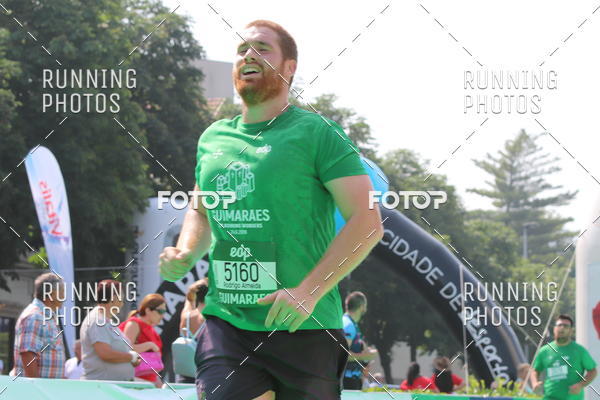 Buy your photos of the eventMeia Maratona Guimares on Fotop