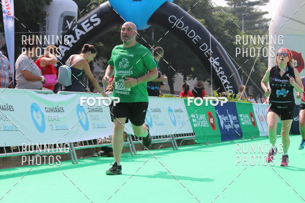 Buy your photos of the eventMeia Maratona Guimares on Fotop